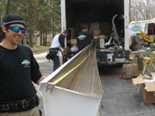 Forming aluminum gutters before installation in Alpharetta
